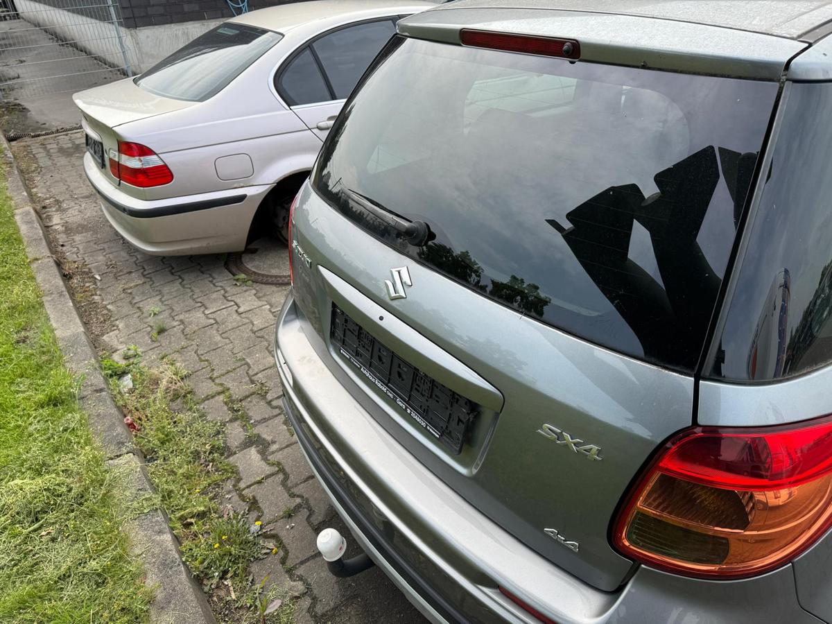 Suzuki SX4 EY original Heckklappe mit Scheibe ZCD Galactic Grey Rohbau BJ11